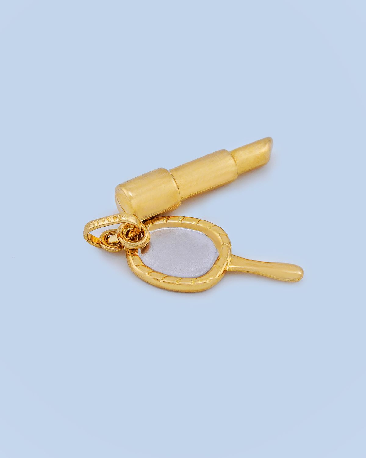 Dije de Espejo y Creyon 14K
Dimensiones 12mm x 4mm
Peso 0.8g