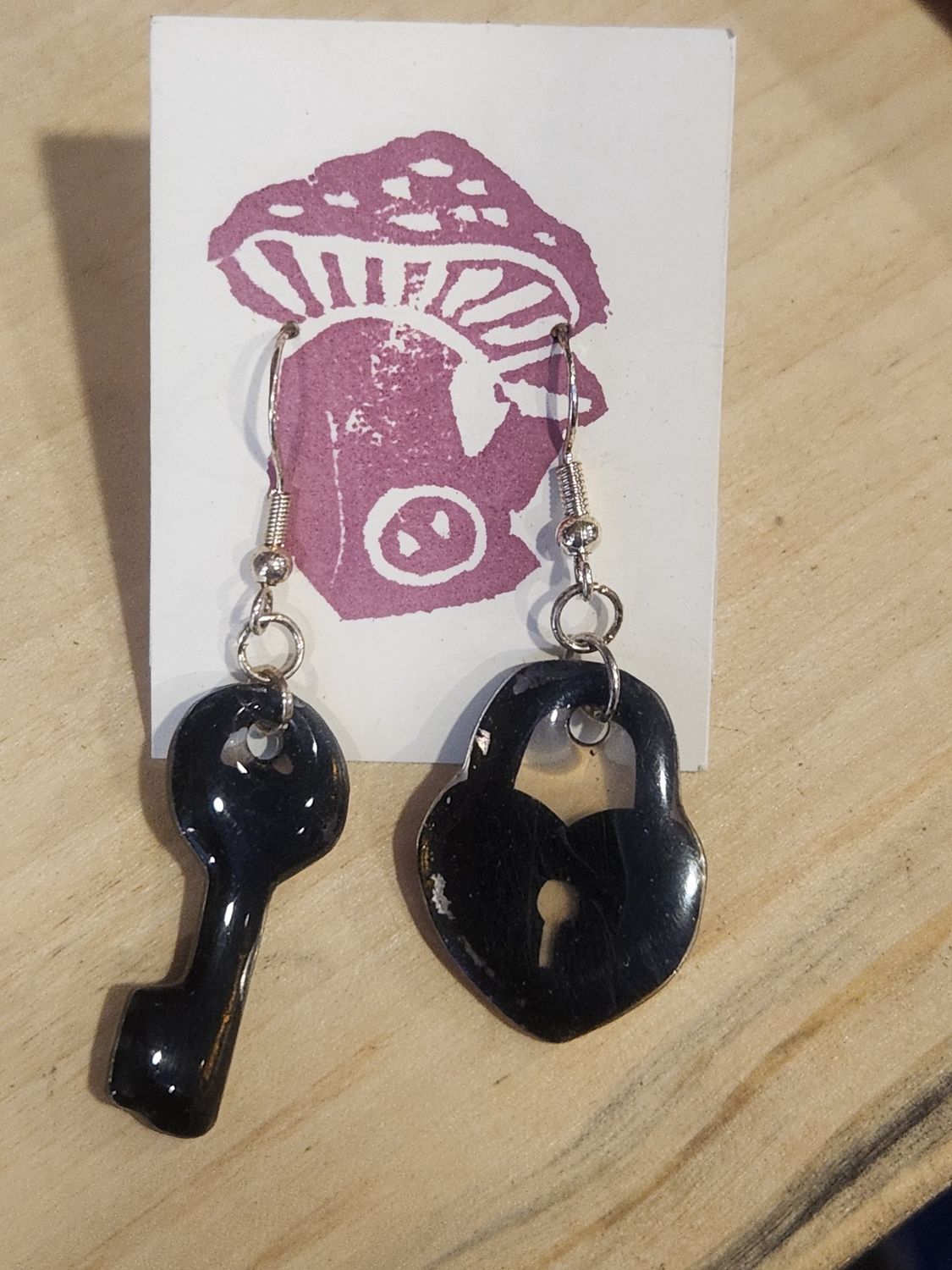 $9 earrings, style: lock &amp; key