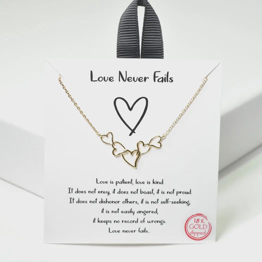 Love Never Fails dainty heart necklace