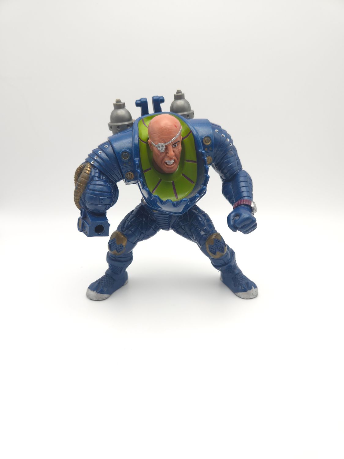 Front view of the figure, highlighting the fierce facial expression and detailed design of the armor and jet pack.