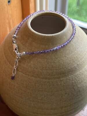 Micro-faceted beaded lilac Amethyst Bracelet sterling silver lobster claw clasp and adjustable extension.