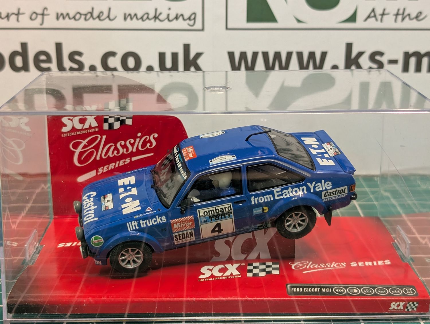 PRE-OWNED SCX Ford Escort MkII Lombard Rally 'Eaton Yale' No.4 [63570]