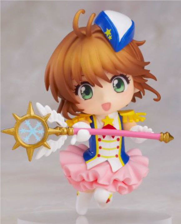 Figurita Card Captor Sakura y Libro