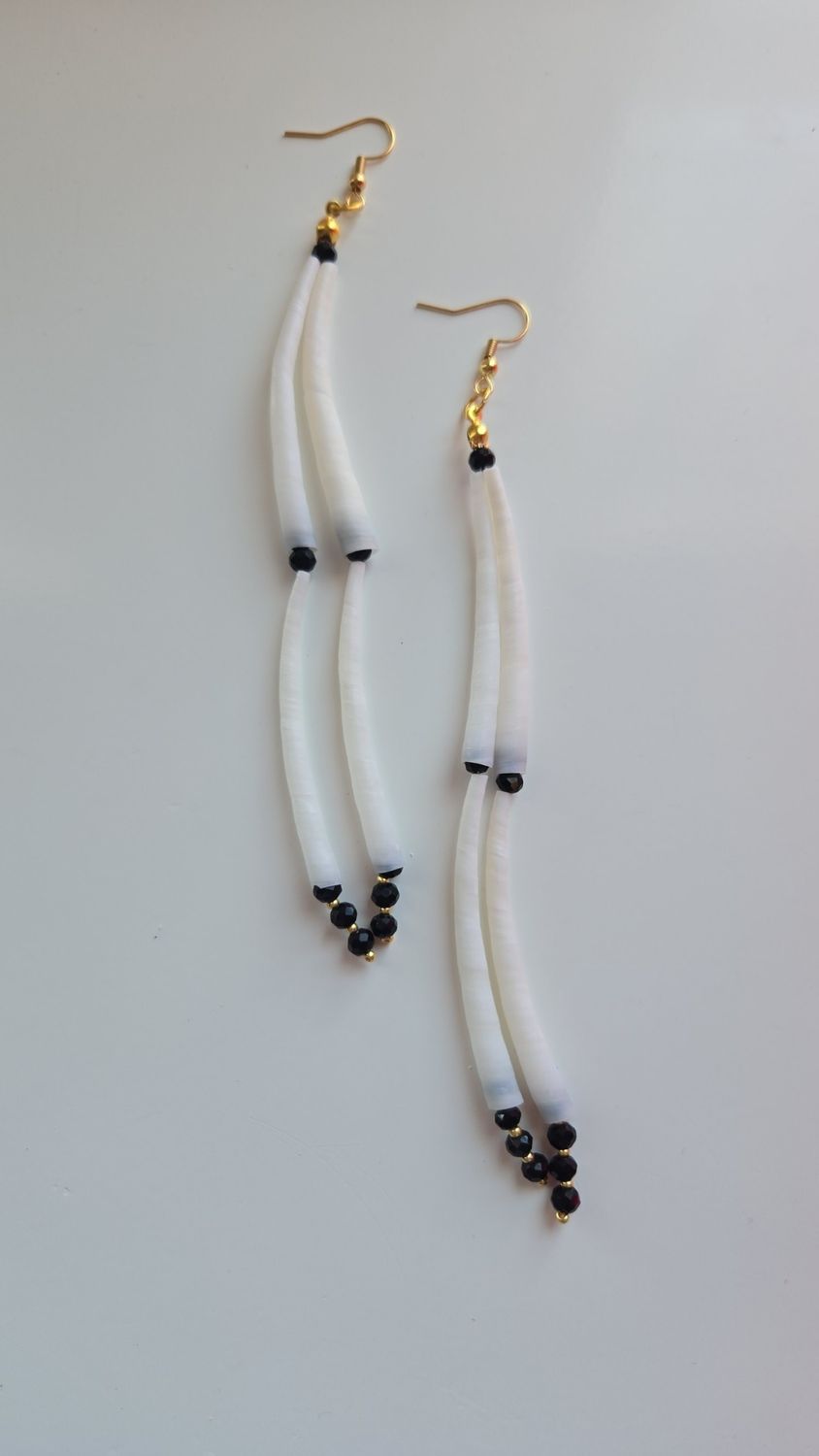 Name Dentalium shells with black rondelle beads