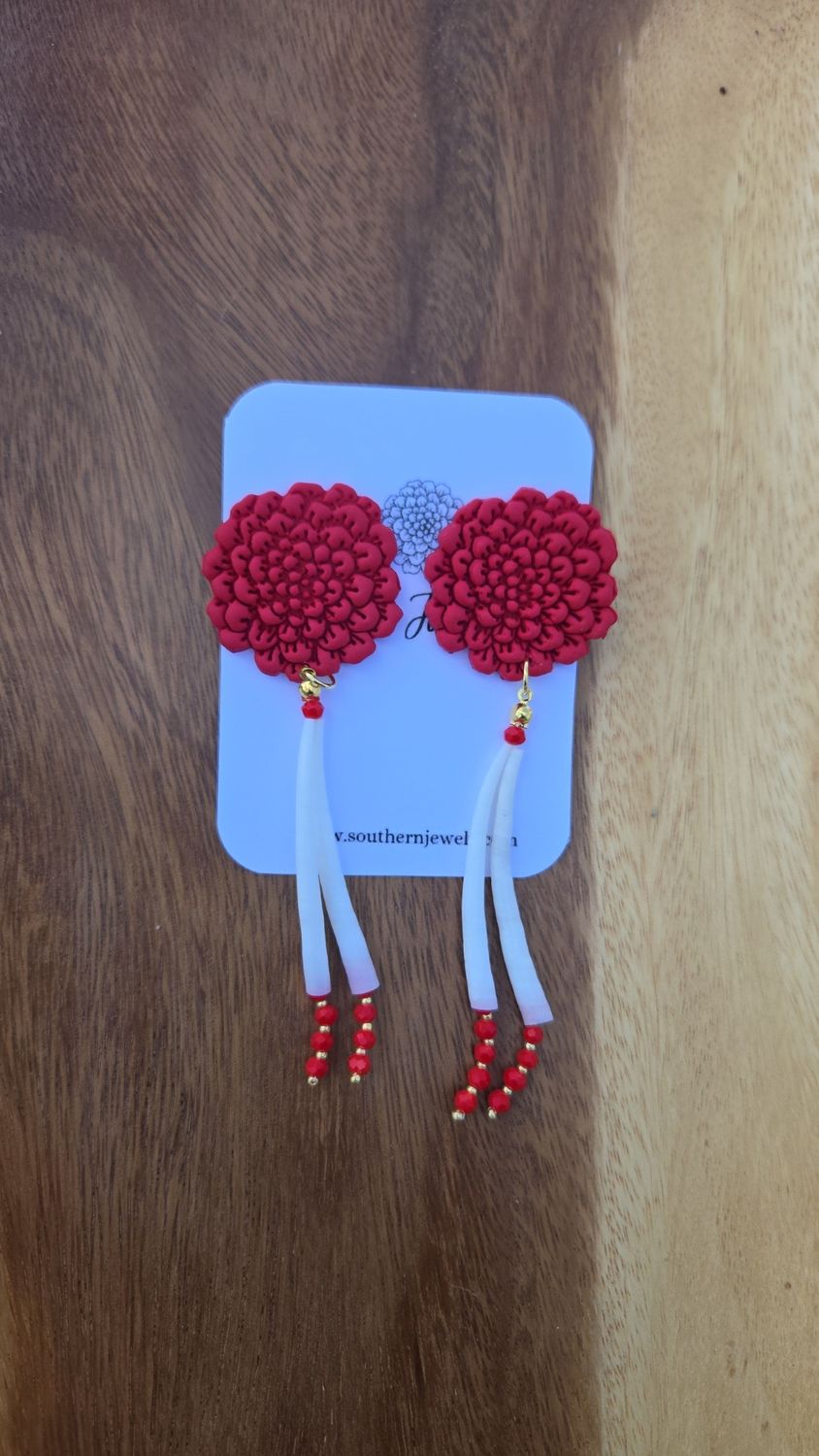 Pinecone and dentalium shells