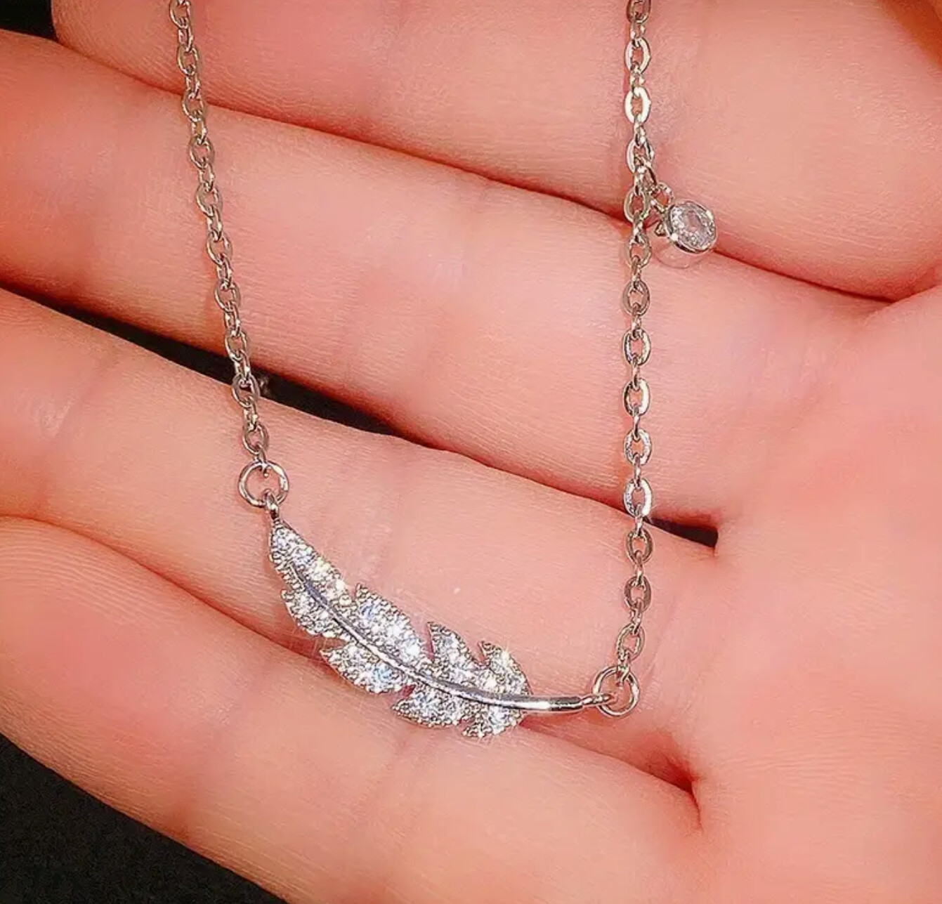 Angel feather necklace clearance