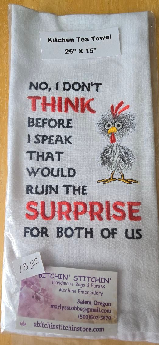 “Ruin the Surprise” Embroidered Kitchen Towel