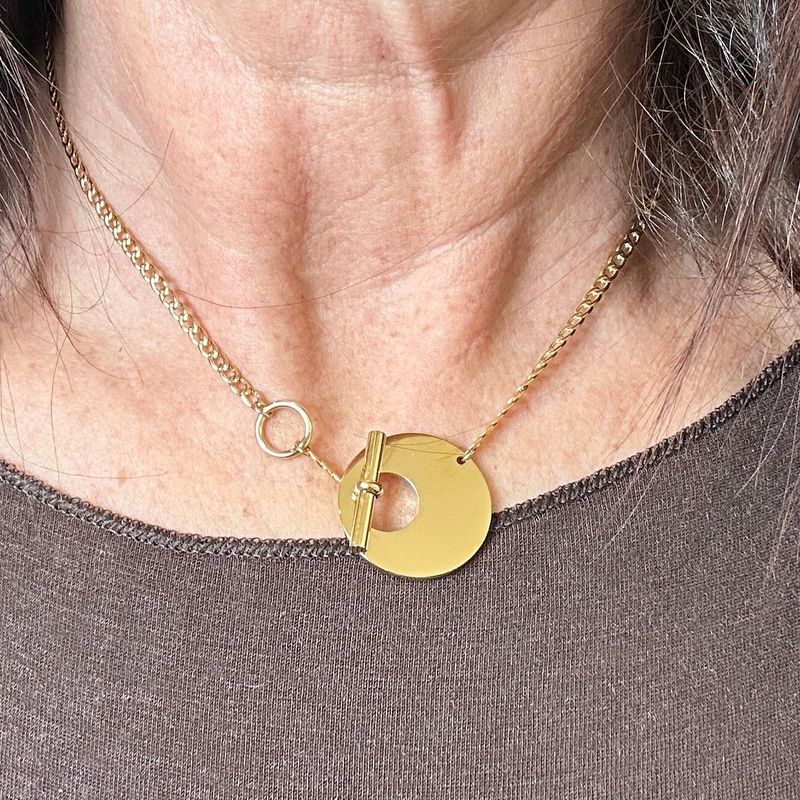 Collana in acciaio dorato con centrale tondo-Zag Bijoux Collana in acciaio dorato con centrale tondo-Zag Bijoux