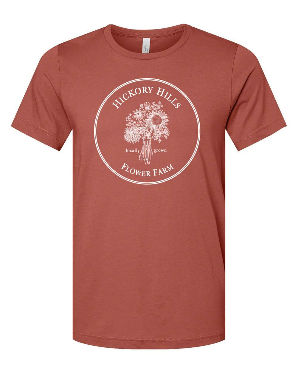 Reddish, pinkish terracotta t-shirt with white logo