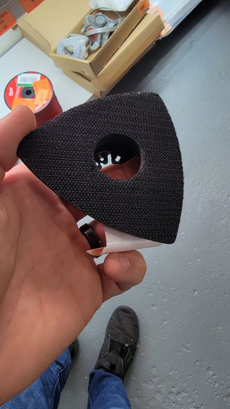 Oscillating tool sanding pad attachment