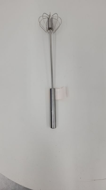 Semi automatic egg beater