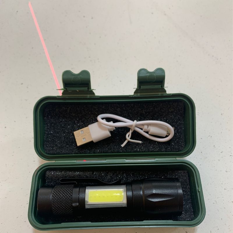 Rechargeable flashlight in green case