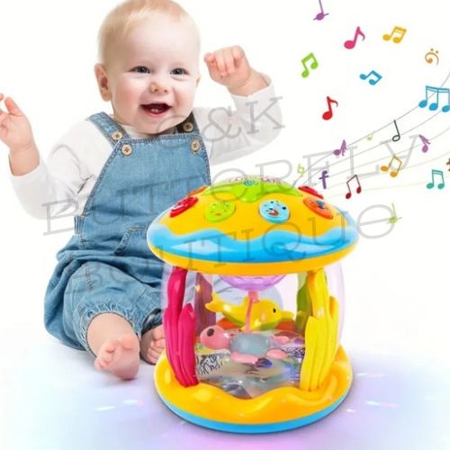 Musical play gym with ocean projector lights