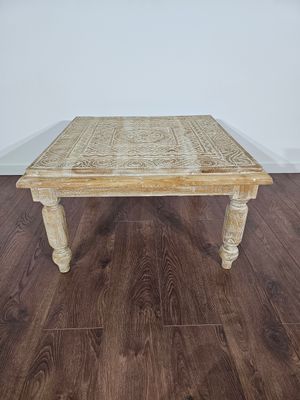 Salontafel gegraveerd.
