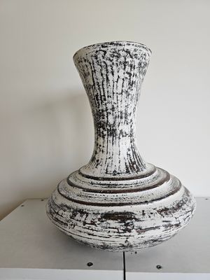 Vaas Guci Tuyul.