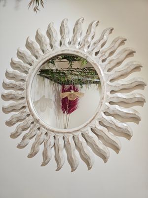 Ronde spiegel zon.