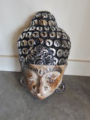 Houten boeddha masker.