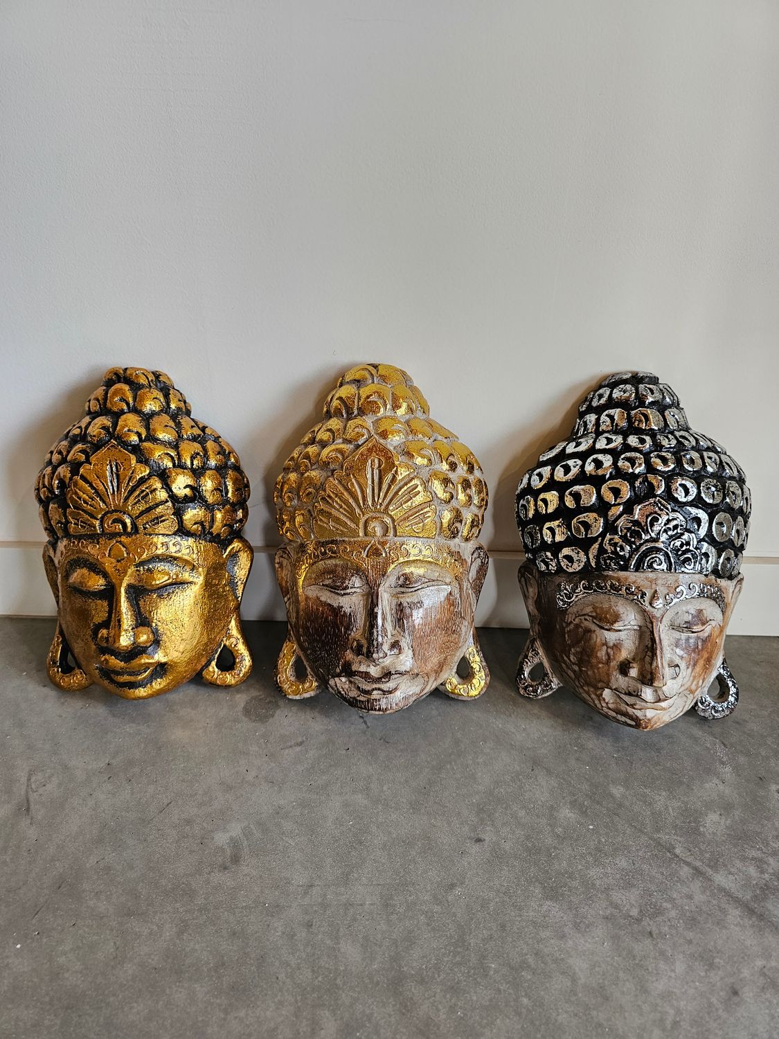 Houten boeddha masker.