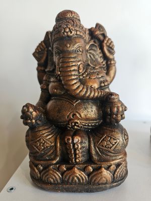 Ganesha zittend.