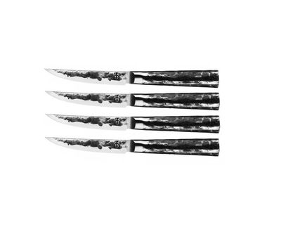Forged Intense steakmessen set meerdere messen op tafel MeatMan Rillaar