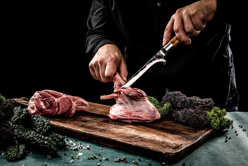Forged Olive uitbeenmes in gebruik vlees van bot verwijderen nauwkeurig
