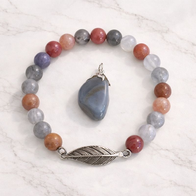 Juwelenset Rhodoniet en hanger grijze agaat