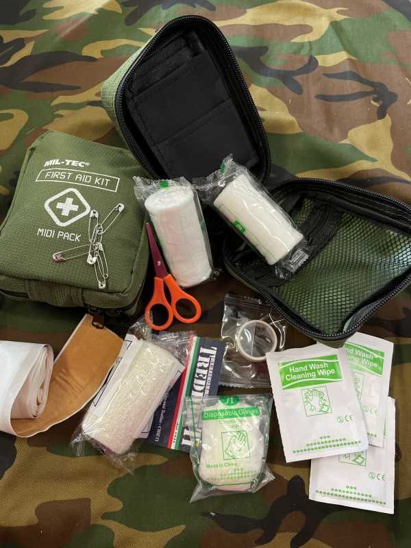 Kit di primo soccorso piccolo First AID mini pack MILTEC Kit di primo soccorso piccolo First AID mini pack MILTEC