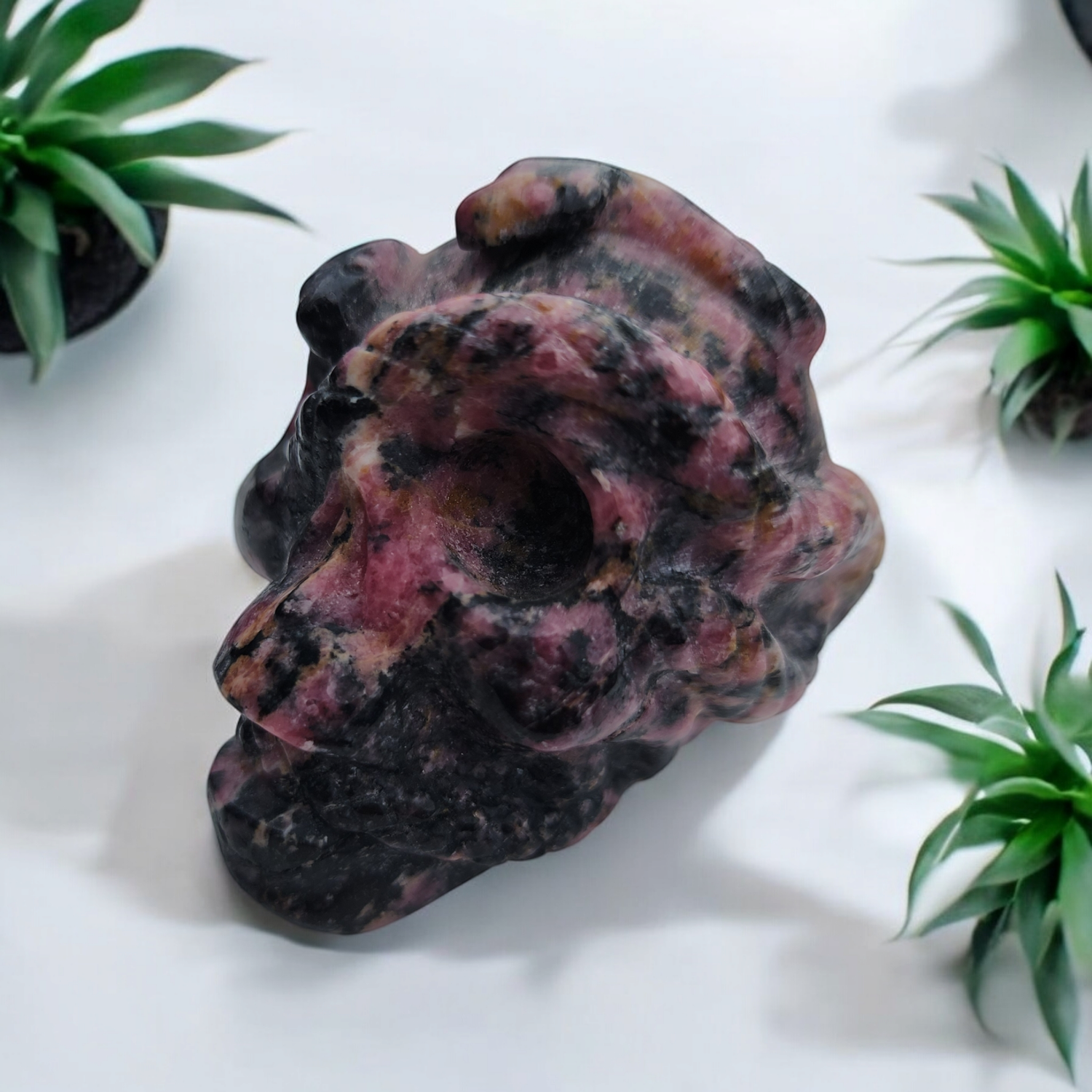 Rhodonite Skull with Snakes