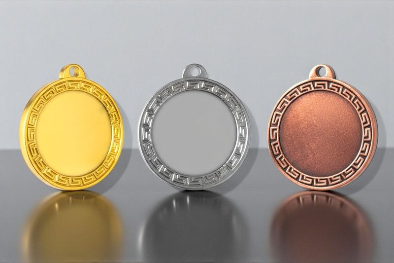 Klassische Metallmedaille mit glatter Vorderfläche und umlaufendem Ornamentrand. Durchmesser Ø 3 cm