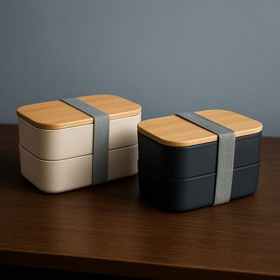 Lunchbox zweistöckig mit Bambusdeckel, ab € 22,50 Zweistöckige Lunchbox mit Bambusdeckel und Besteck