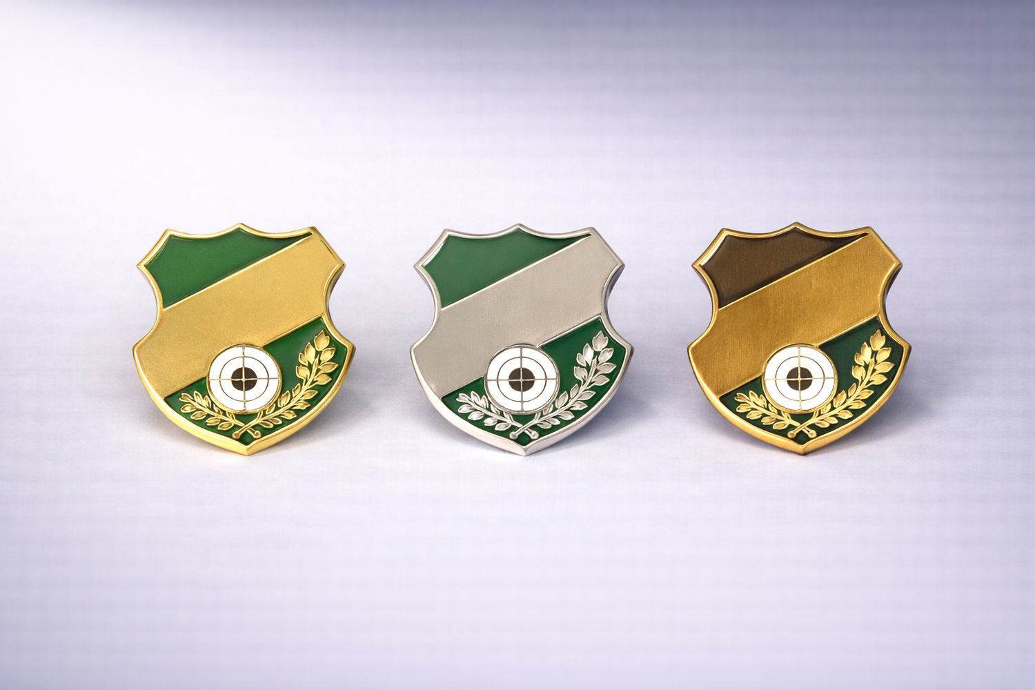 Ansteckpin Schützenabzeichen Wappenschild in Gold Silber Bronze mit Zielscheibenmotiv