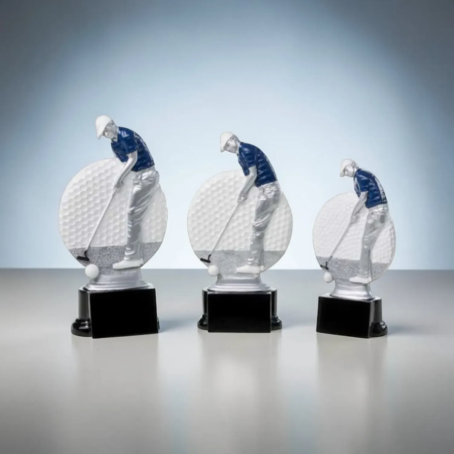 Golftrophäe Putting Champion mit Golferfigur und Golfball-Motiv auf schwarzem Sockel