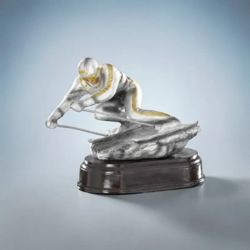 Skirennläufer Resinfigur silber gold auf schwarzem Sockel 20 cm