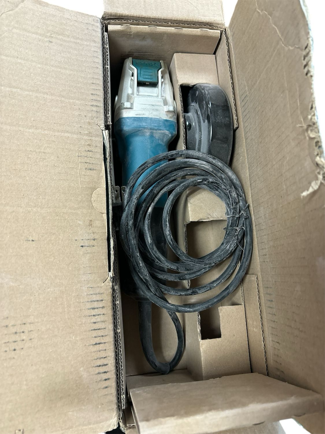 Makita 7.5 Amp Corded 4-1/2 in. X-LOCK Angle Grinder with AC/DC Switch GA4570 . .