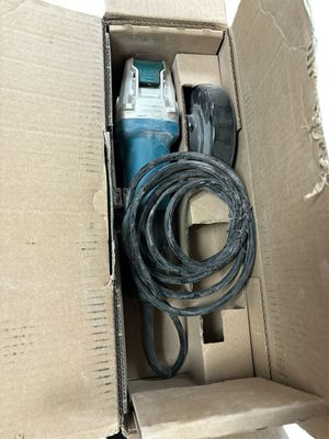 Makita 7.5 Amp Corded 4-1/2 in. X-LOCK Angle Grinder with AC/DC Switch GA4570 . .