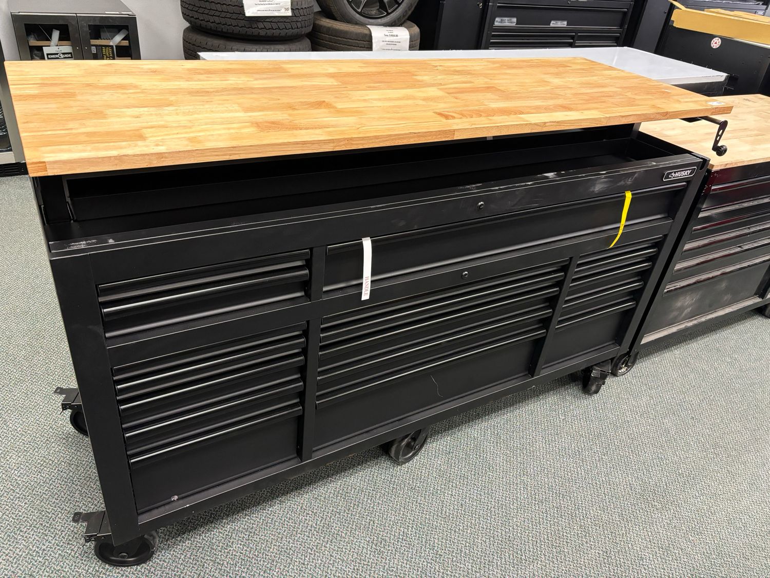 Husky 72 in. W x 24 in. D Heavy Duty 18-Drawer Toolbox Mobile Workbench Cabinet with Adjustable-Height Hardwood Top in Matte Black HOLC7218BB1MYS