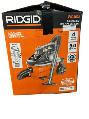 RIDGID 4 Gallon 5.0 Peak HP Portable Shop Vacuum Wet Dry Vac with Fine Dust Filter, Locking Hose and Accessory Attachments WD4070 .