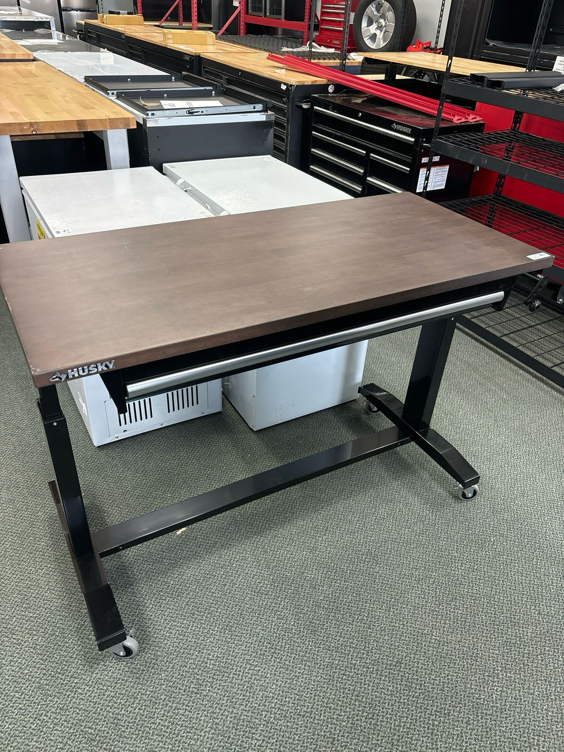 Husky 52 in. W x 24 in. D 1-Drawer Adjustable Height Gloss Black Workbench with Dark Stained Wood Top HOLT5201B11