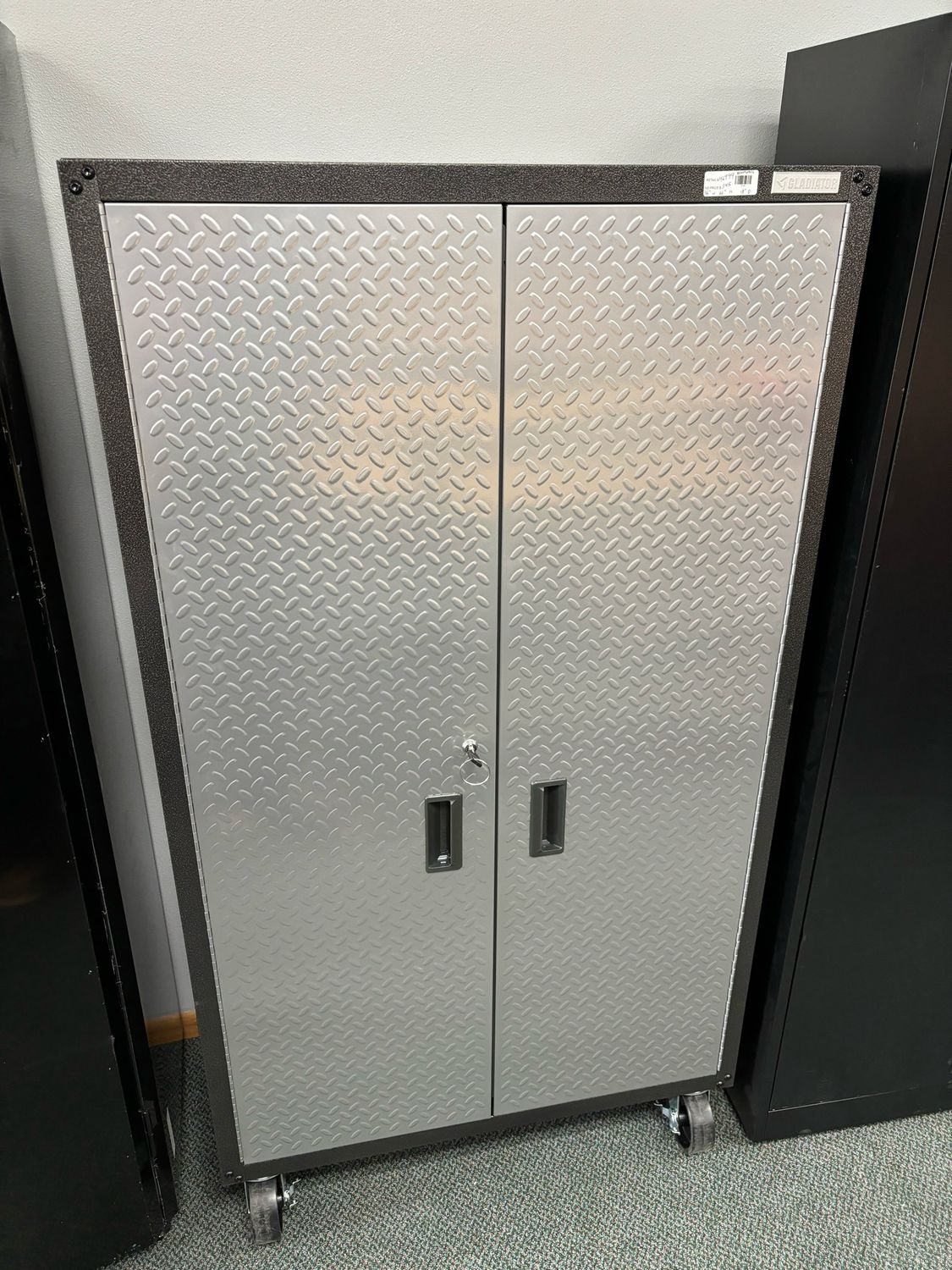 Gladiator Ready-to-Assemble Steel Freestanding Garage Cabinet in Silver Tread with Casters (36 in. W x 66 in. H x 18 in. D) GALG36CKXG