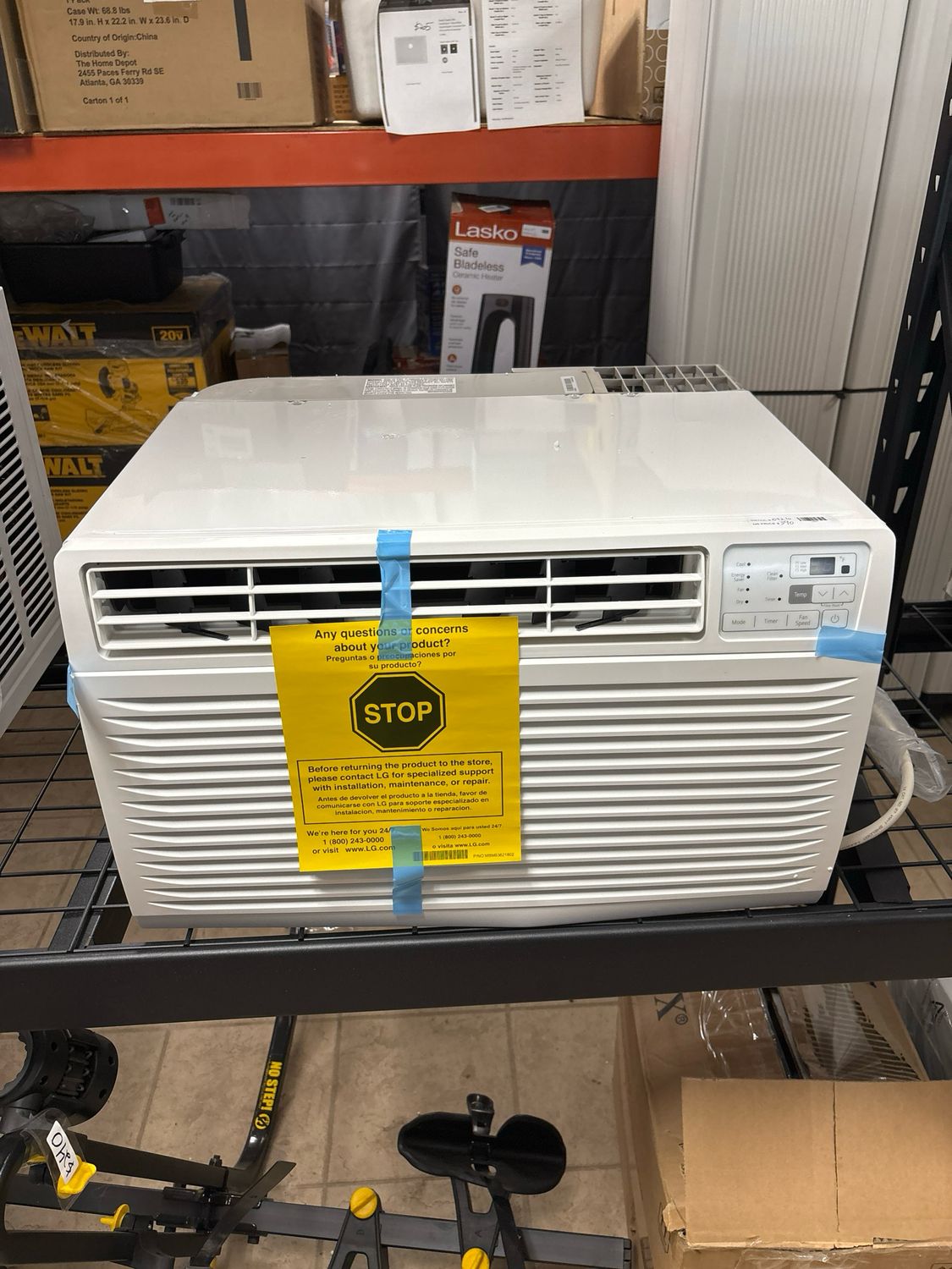 LG 11,800 BTU 230-Volt Through-the-Wall Air Conditioner Cools 540 Sq. Ft. with and remote in White LT1236CER