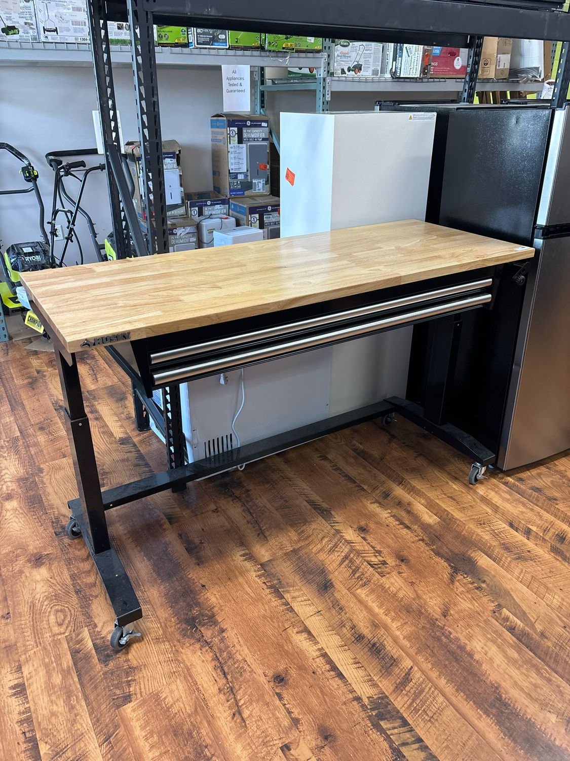 Husky 62 in. W x 24 in. D 2-Drawer Adjustable Height Black Workbench Table with Solid Wood Top HOTL6202B12 .