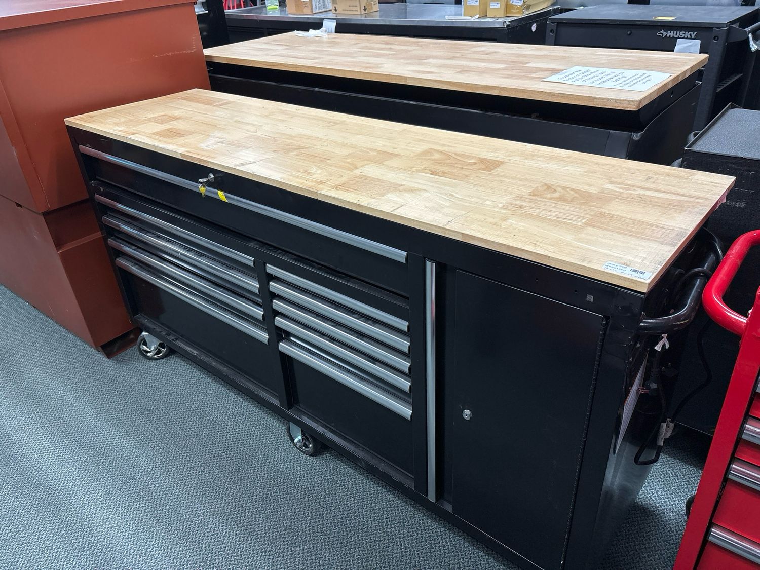 Husky Standard Duty 72 in. W x 20 in. D 10-Drawer Gloss Black Mobile Workbench Cabinet with Solid Wood Top H72MWC10BLK-TL