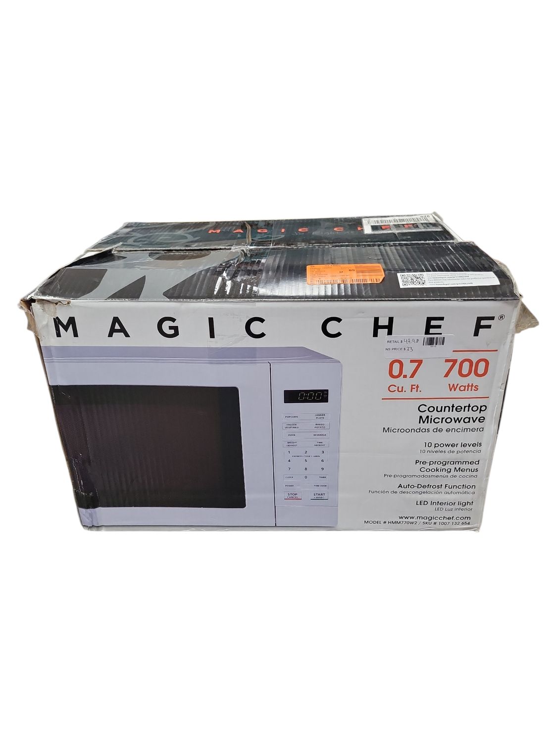 Magic Chef 0.7 cu. ft. 700-Watt Countertop Microwave in White HMM770W2 .