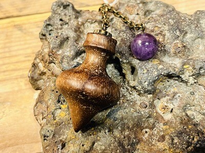 Pendule en bois d'ébène