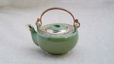 Reaching Out - Light Green Teapot