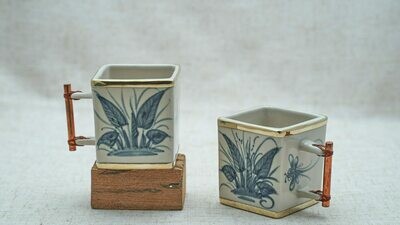 Square teacups with dragonfly motifs
