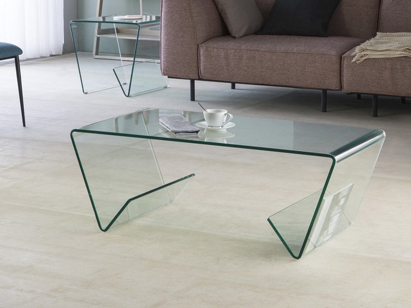 Mesa auxiliar realizada en cristal curvado transparente Mesa auxiliar realizada en cristal curvado transparente