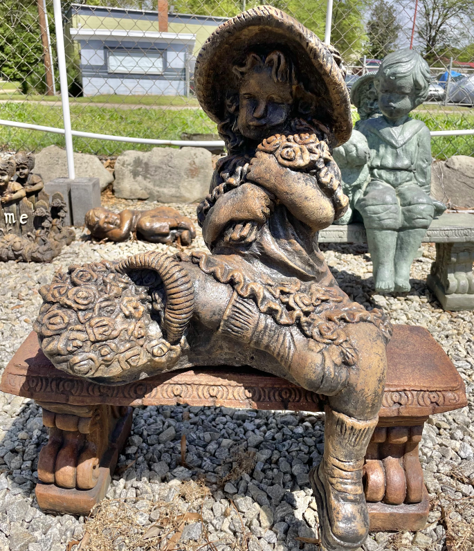 Girl With Flowers on Bench