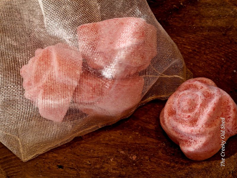 Amberblokje mini Roos in Organza zakje 