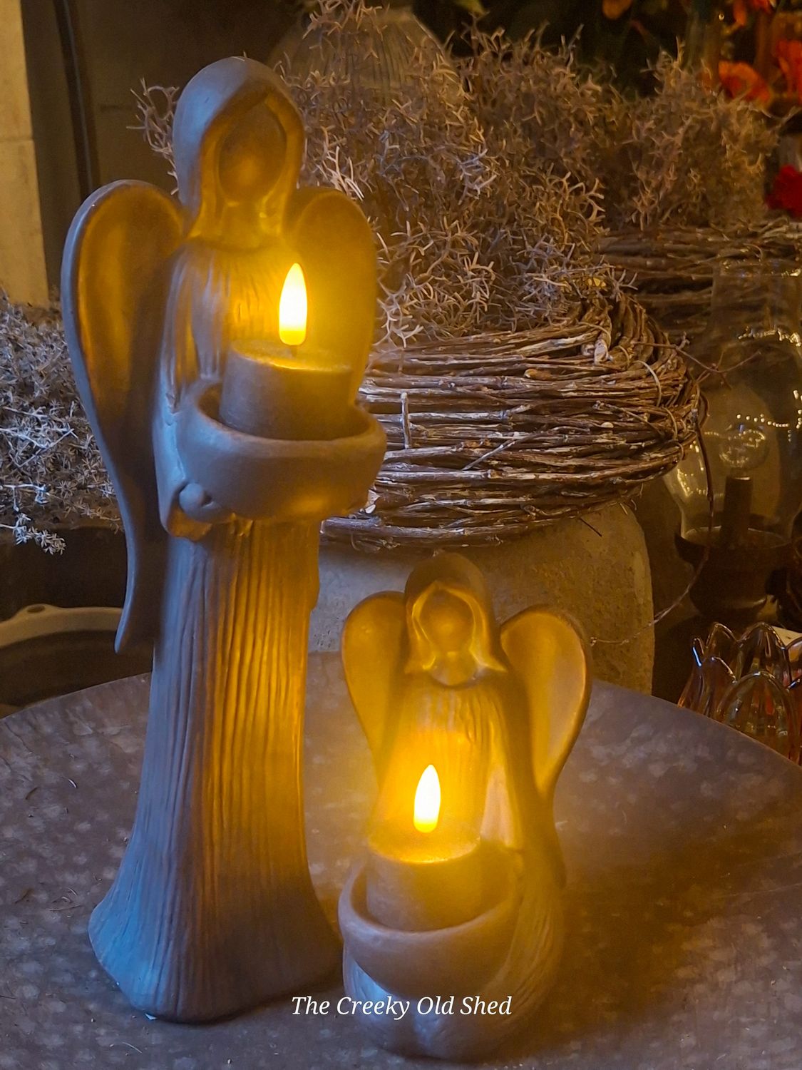 Engel zittend met waxinelichthouder – Countryfield